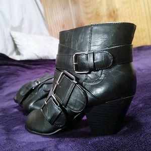 Ankle boots .Black with buckles.